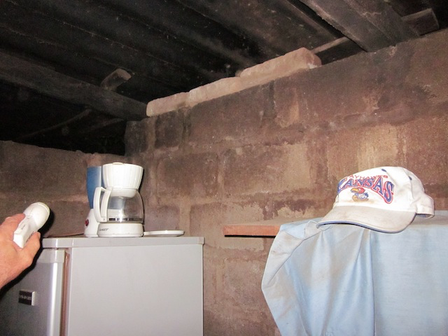 Ron inspecting the wall