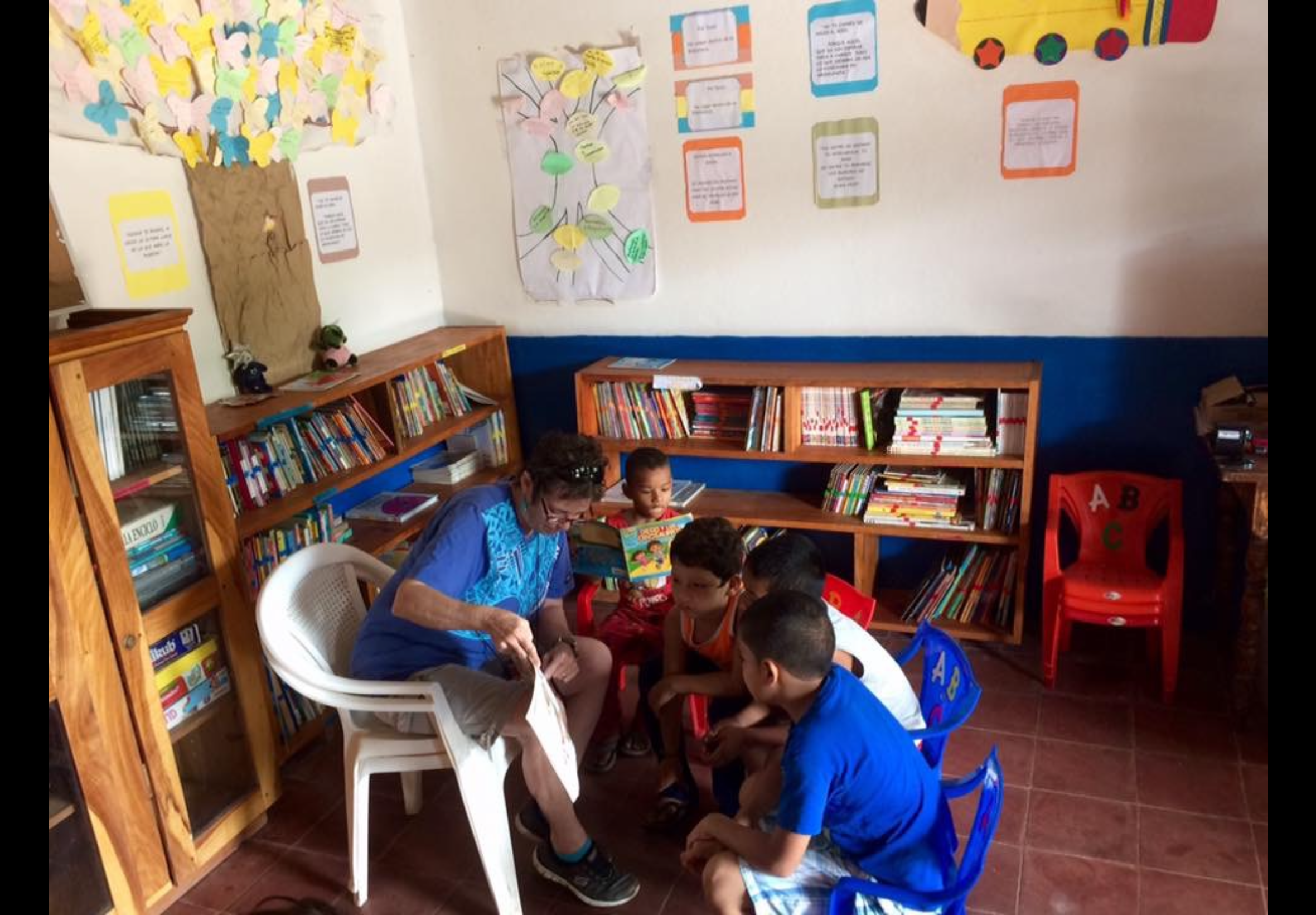 Children reading at the library