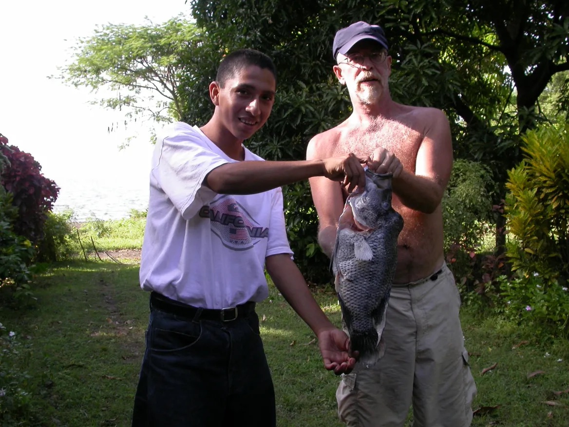 Ron and a neighbor with the day's catch
