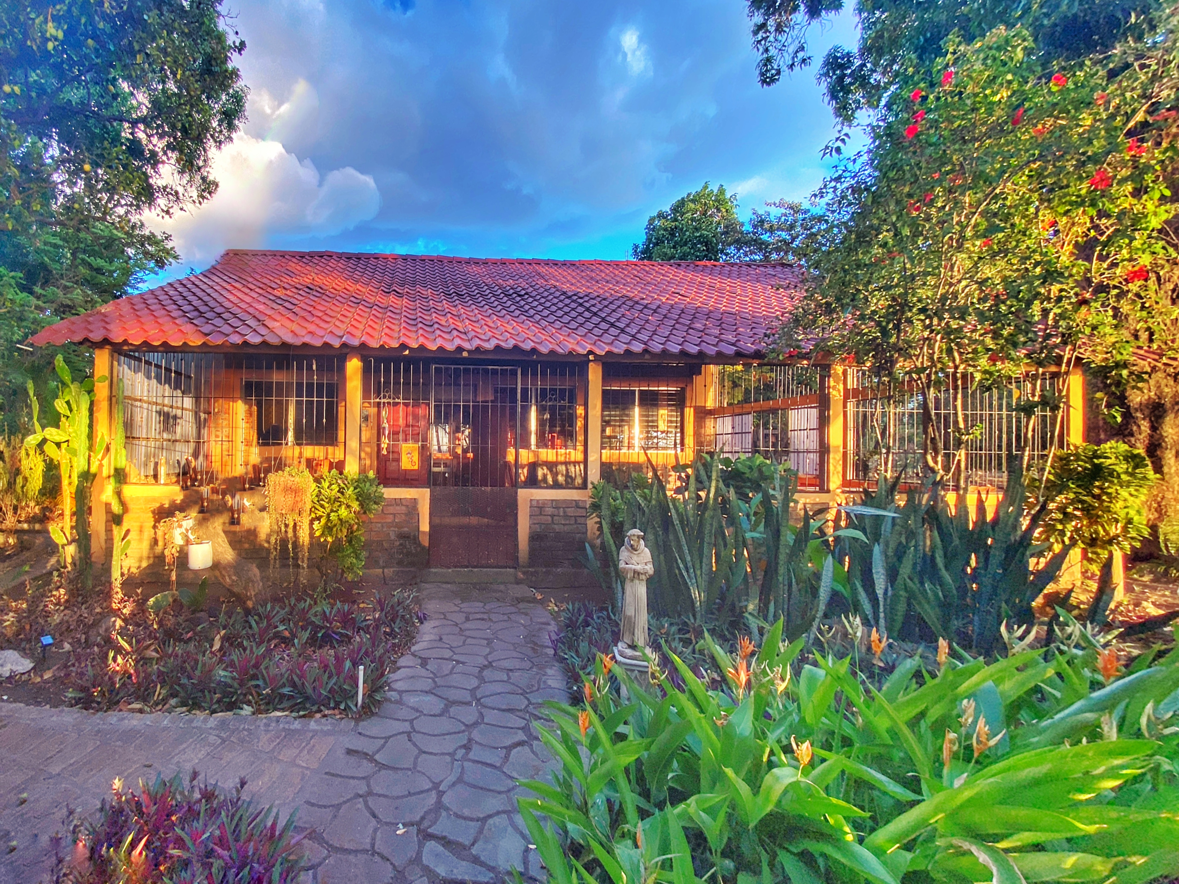 House at dusk with garden